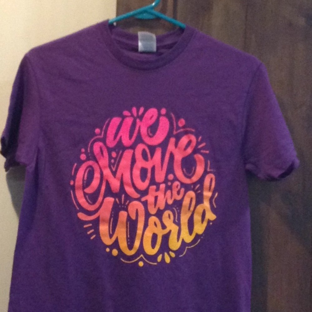 E889=610 Purple WE MOVE THE WORLD T-shirt NWOT LOGG tee
